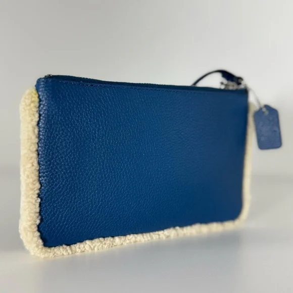 COACH Blue Extra Large Leather Sherpa Wristlet